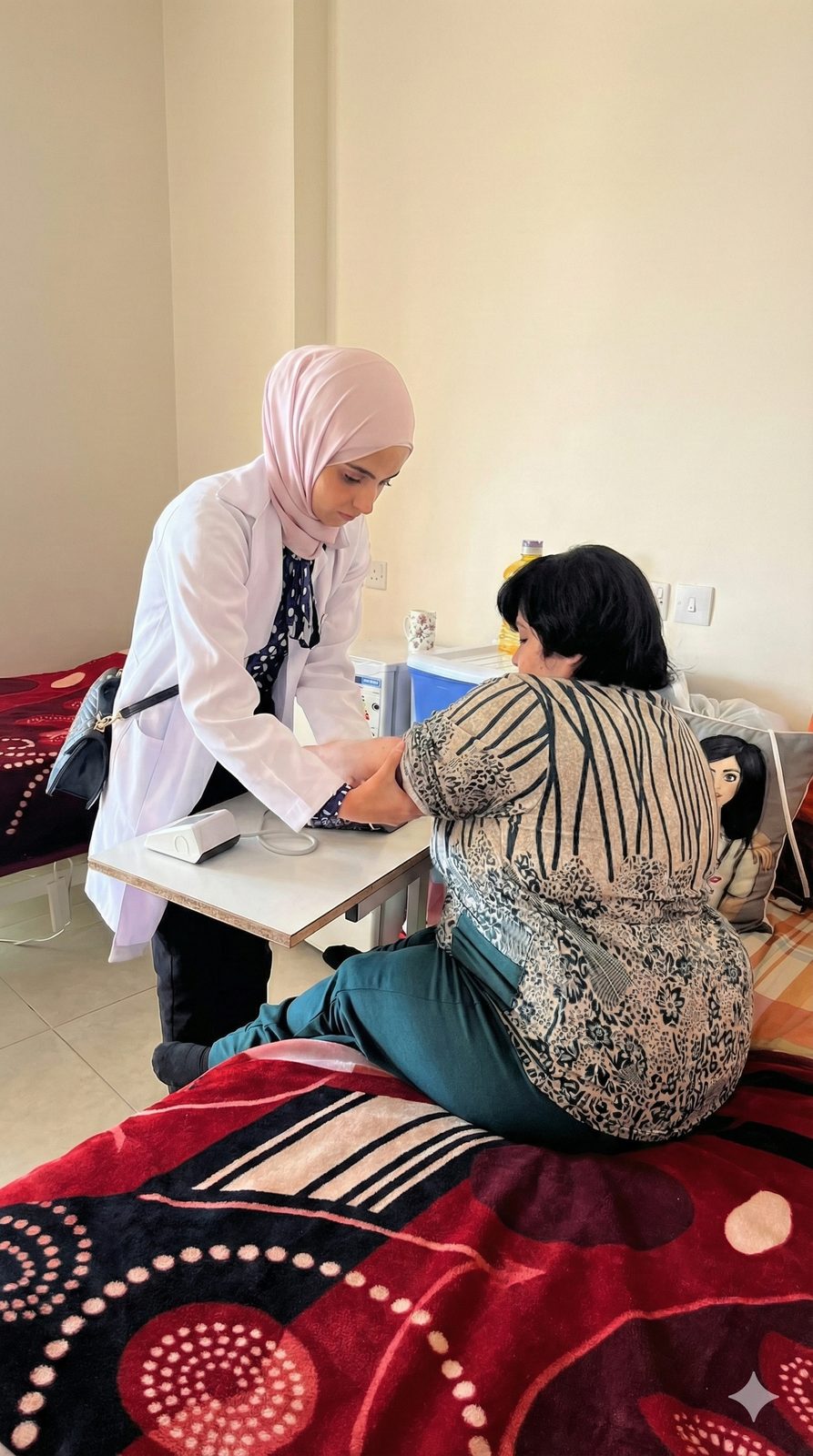 A Hearts for the Homeless volunteer taking a patient's blood pressure during a home screening